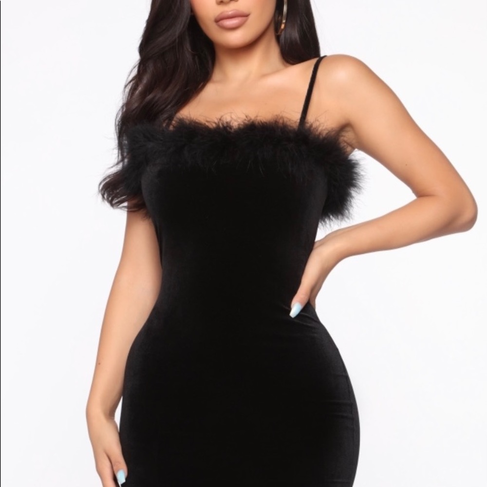 Mini black dress with a twist